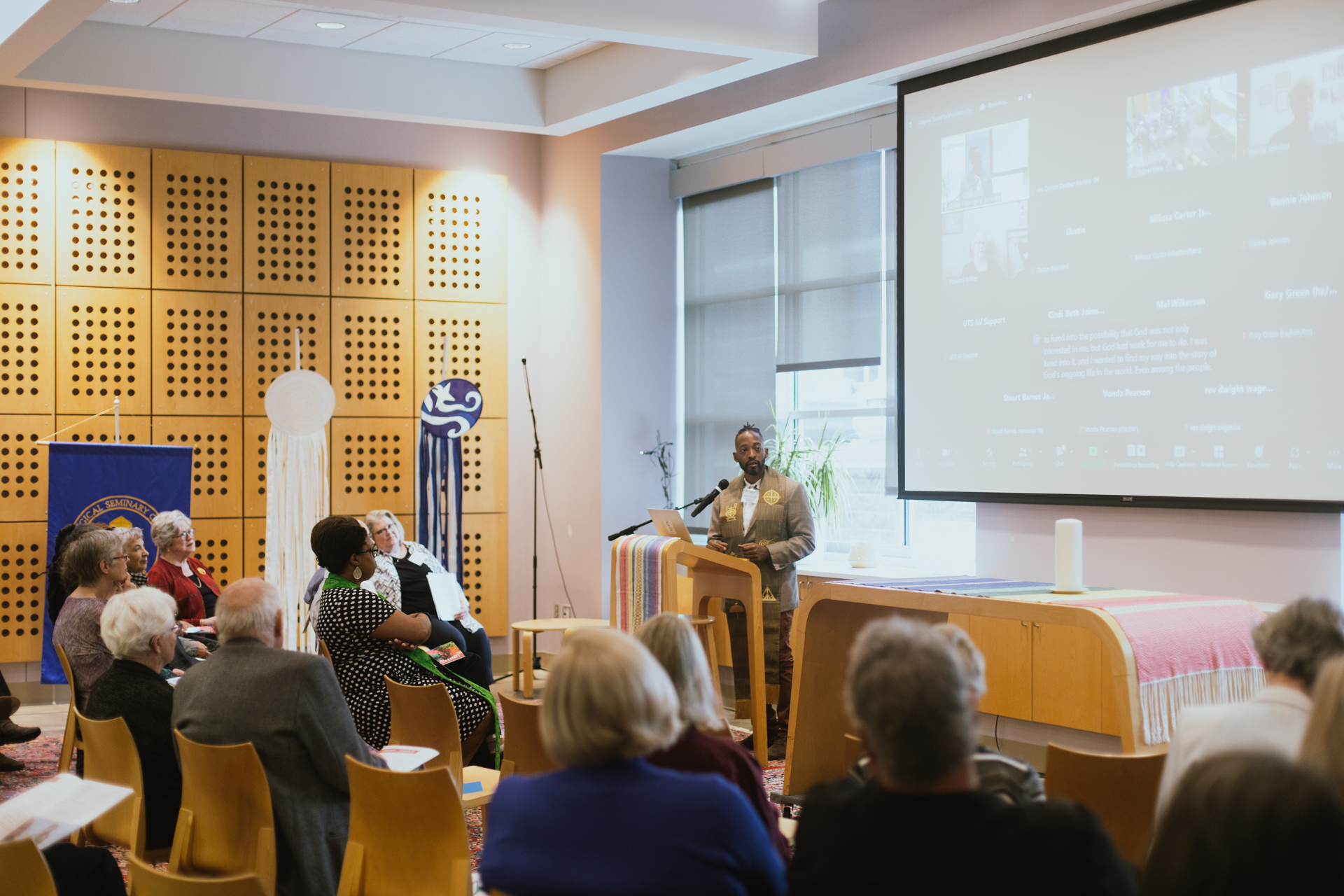 A photo of alum Jermaine Ross-Allam preaching.