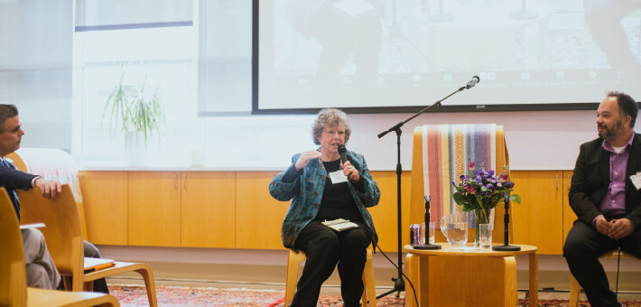 A photo of a former professor speaking.