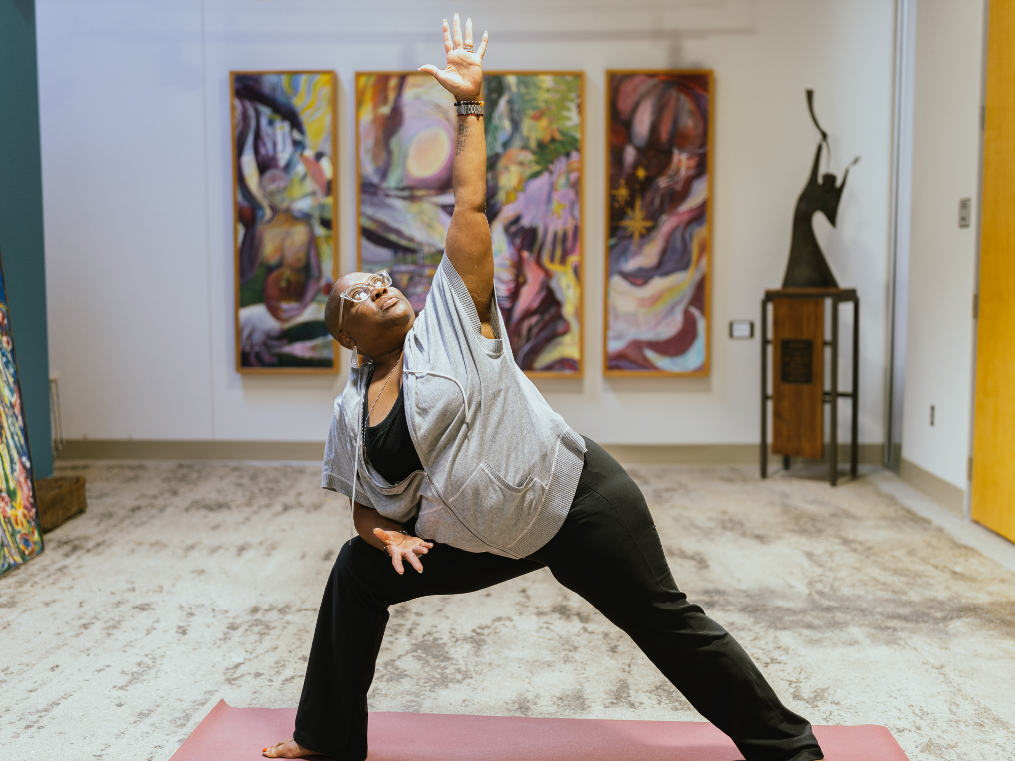 A student strikes a yoga pose.