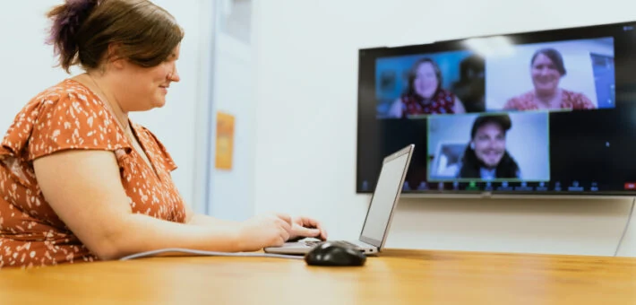 Our admissions team holds a meeting.