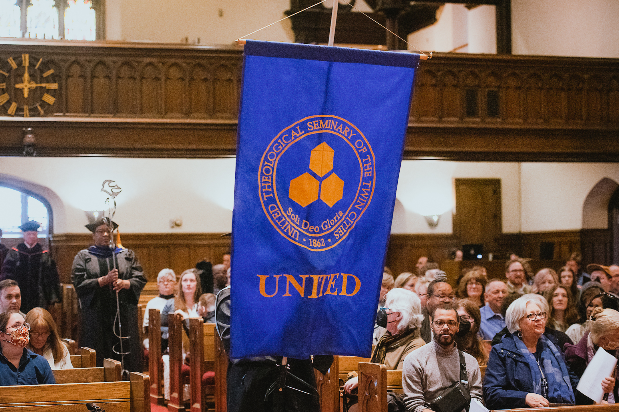 A photo of the United banner during Commencement.