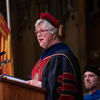 A photo of President Marshall speaking during Commencement.