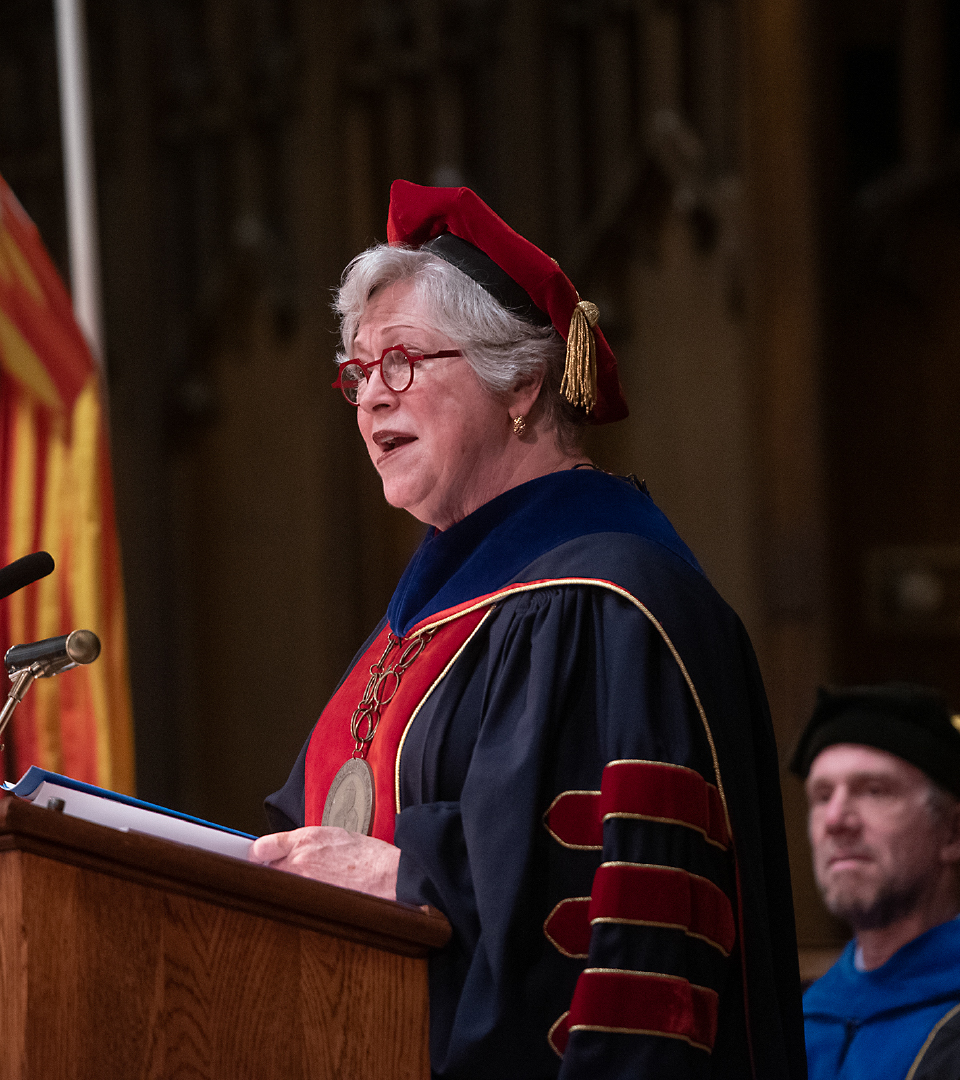 A photo of President Marshall speaking during Commencement.